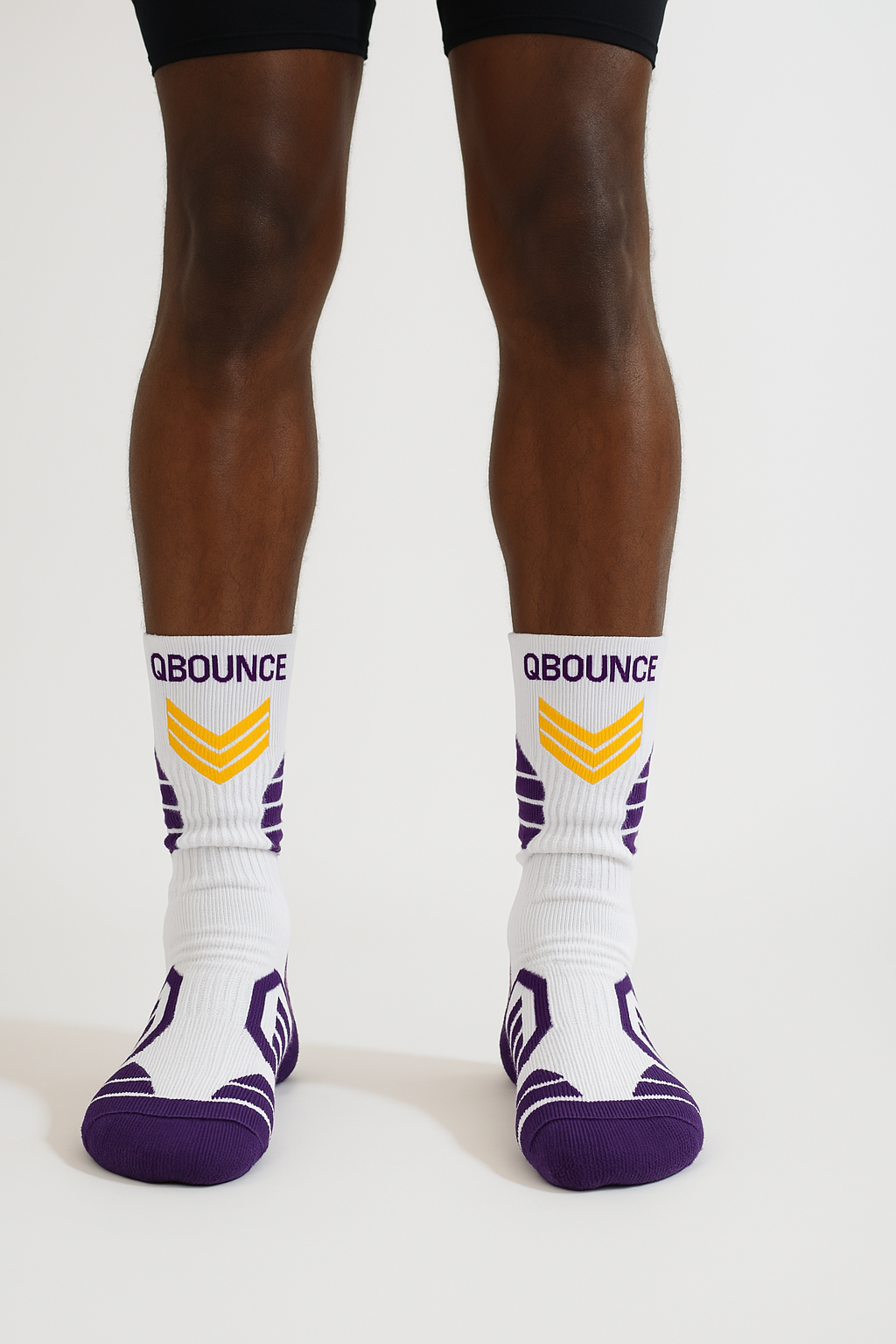 QBounce Grip Socks in white and purple, designed for enhanced agility and grip performance.