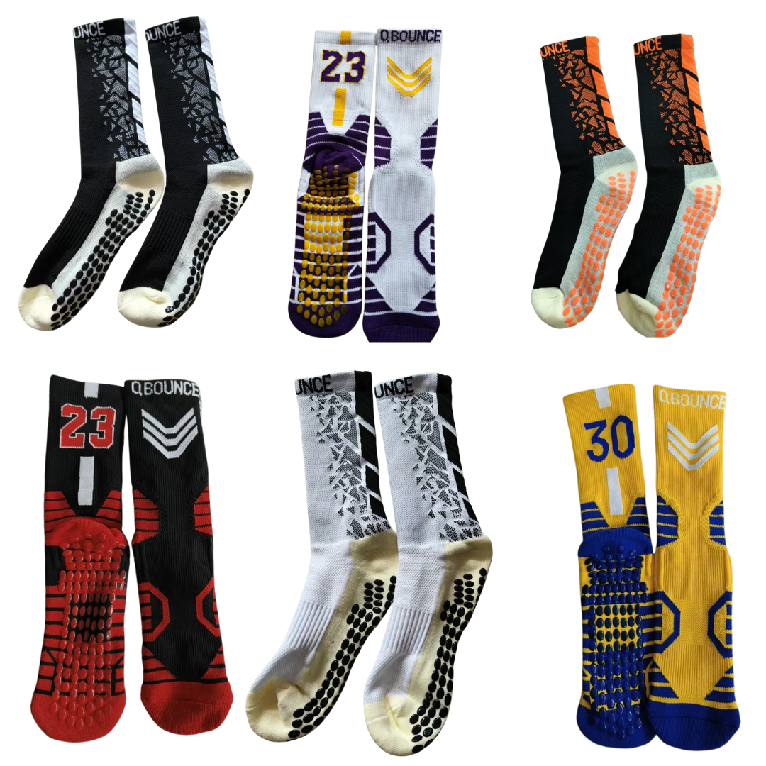 Six pairs of colorful QBounce Grip Socks with anti-slip soles designed for enhanced agility and performance.